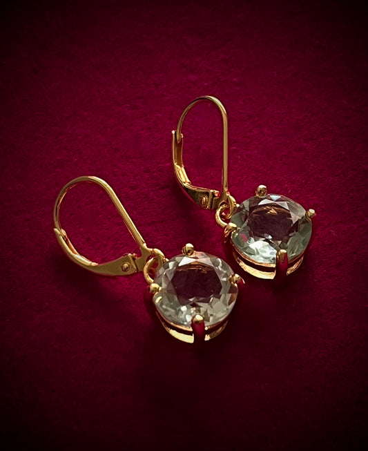 Haspiera Kate's Love green amethyst drop earrings with gold setting on red background