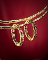 Haspiera multicolor gemstone hoop earrings featuring oval stones set in gold hoops