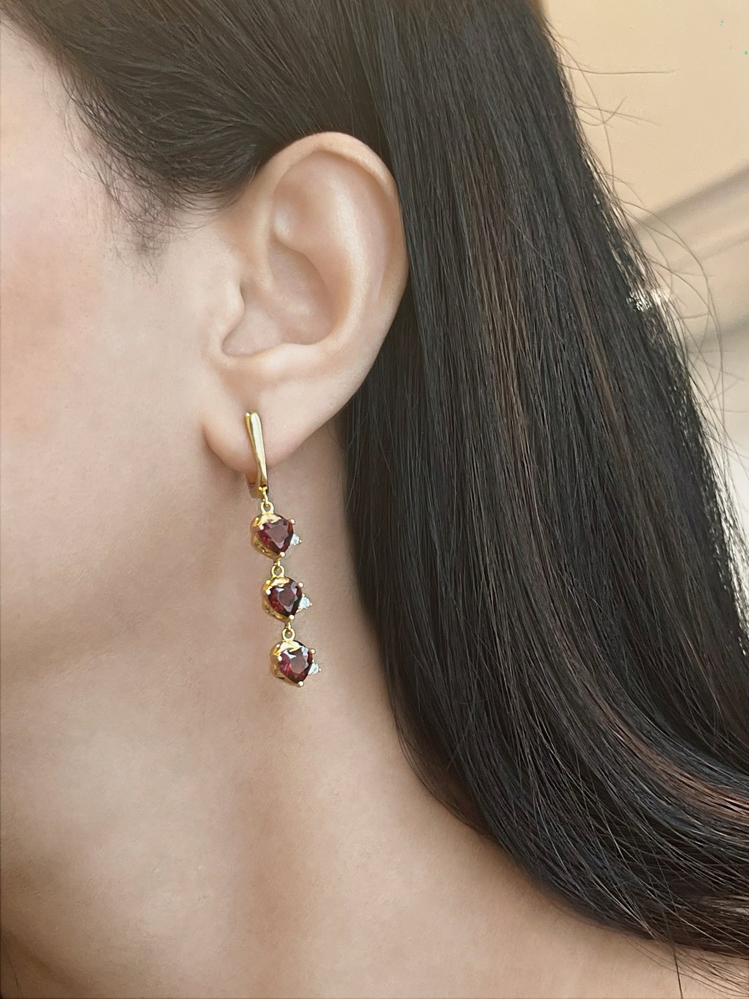 Haspiera demi-fine gemstone earrings for women with three red stones in gold setting