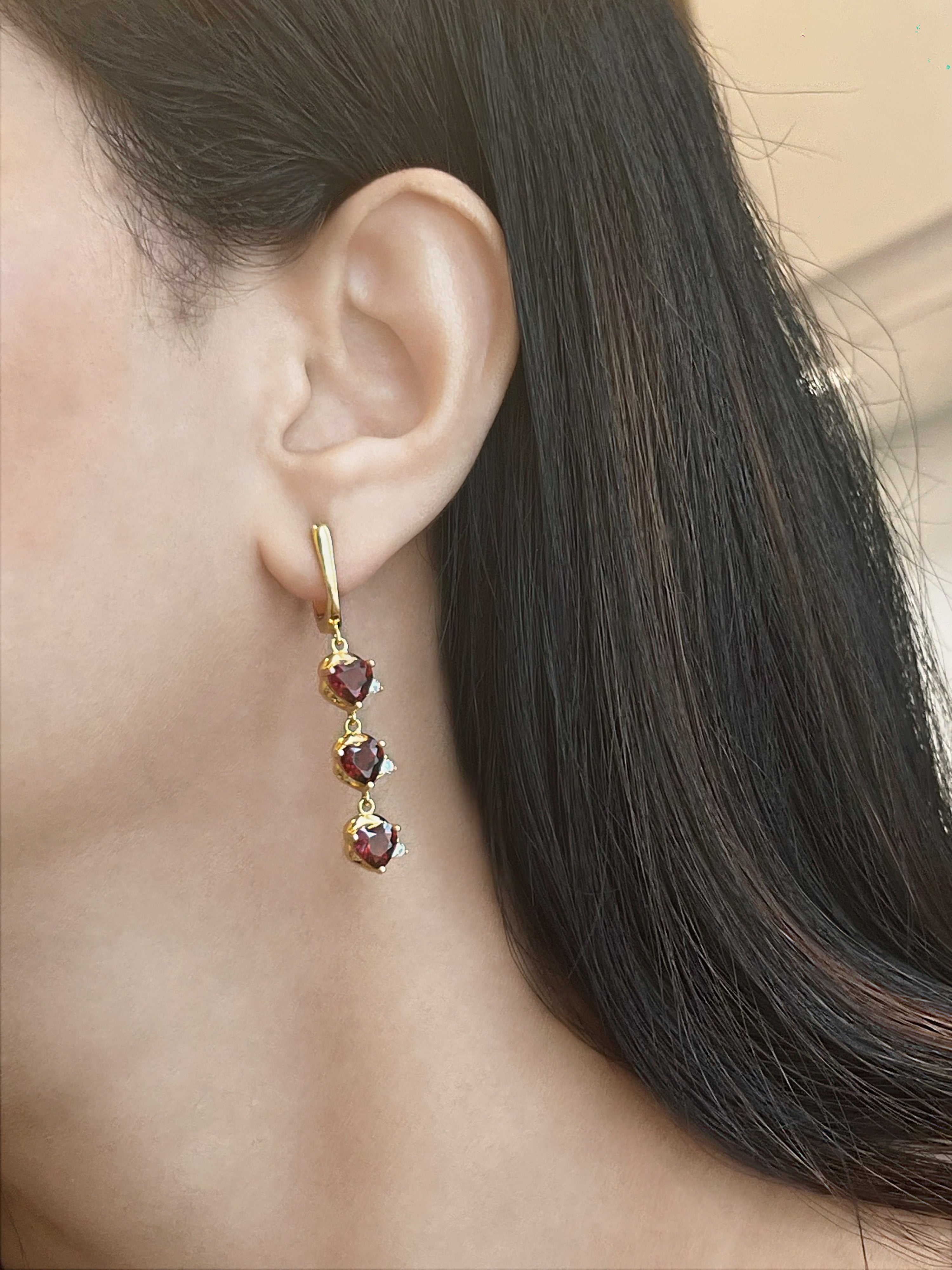 Haspiera demi-fine gemstone earrings for women with three red stones in gold setting