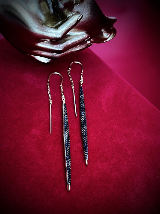 Haspiera unique cocktail party earrings featuring long black textured dangle design with gold accents