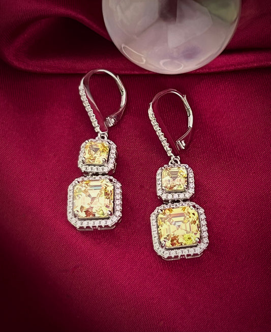 Haspiera yellow dangle earrings in silver with square yellow stones and crystal accents